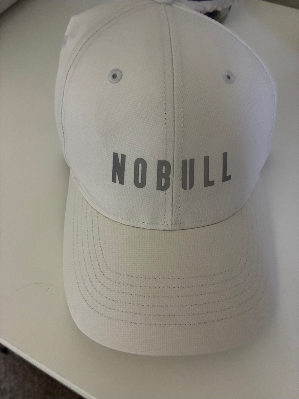 NOBULL White Baseball Cap with Gray Logo